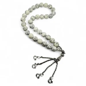 Howlite rosary with polished white beads and silver tassel for calm and focus