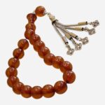 Yumuru kəsim qəhvəyi maskot təsbeh