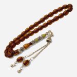 Naqqaşlı narıncı sıxma kəhraba