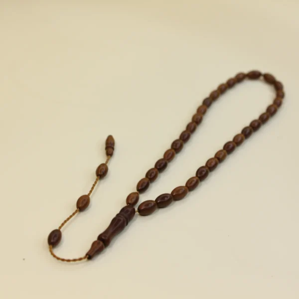 Qəhvəyi kuka təsbeh