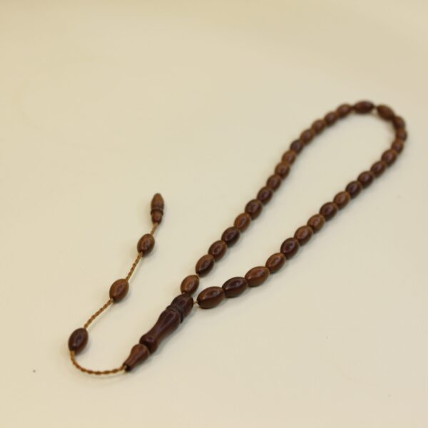 Qəhvəyi kuka təsbeh