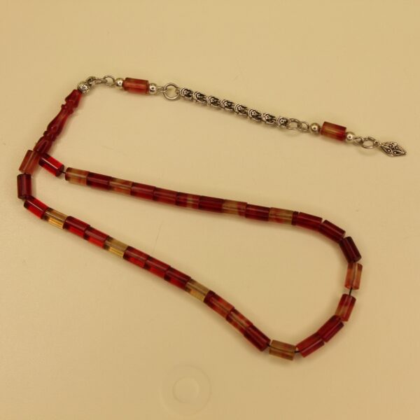 Qırmızı sarı ləkəli bilək boy kəhrəba