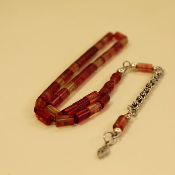 Qırmızı sarı ləkəli bilək boy kəhrəba