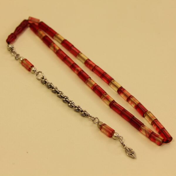 Qırmızı sarı ləkəli bilək boy kəhrəba