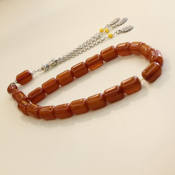 Sarı püsküllü qəhvəyi kəhrəba təsbeh