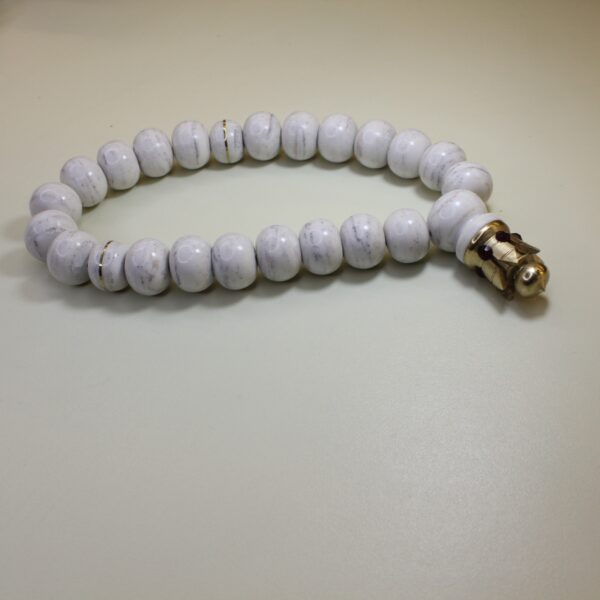 Ağ tacklonlu mərmər təsbeh