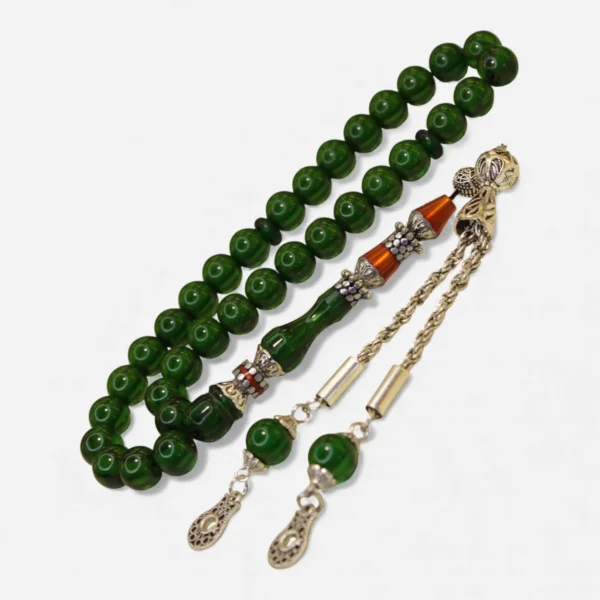 Naqqaşlı yaşıl yumru kəsim sıxma kəhraba