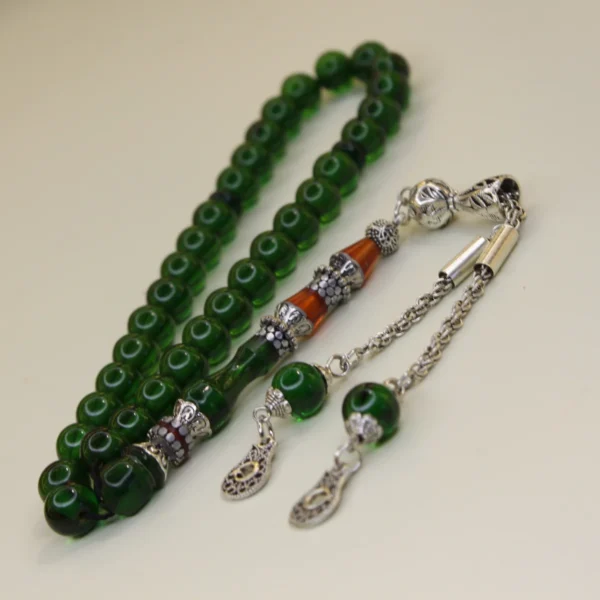 Naqqaşlı yaşıl yumru kəsim sıxma kəhraba